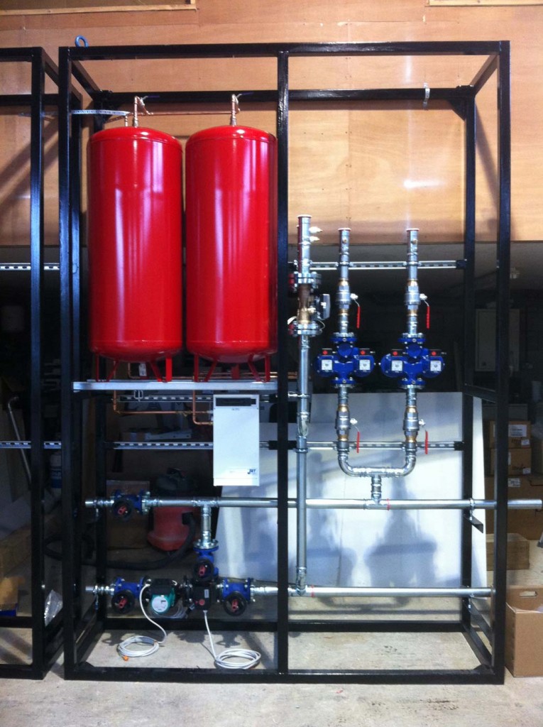 Prefab skid for wood chip boiler on UK poultry farm