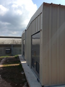 A pair of ETA Hack 200 biomass boiler containers set in place